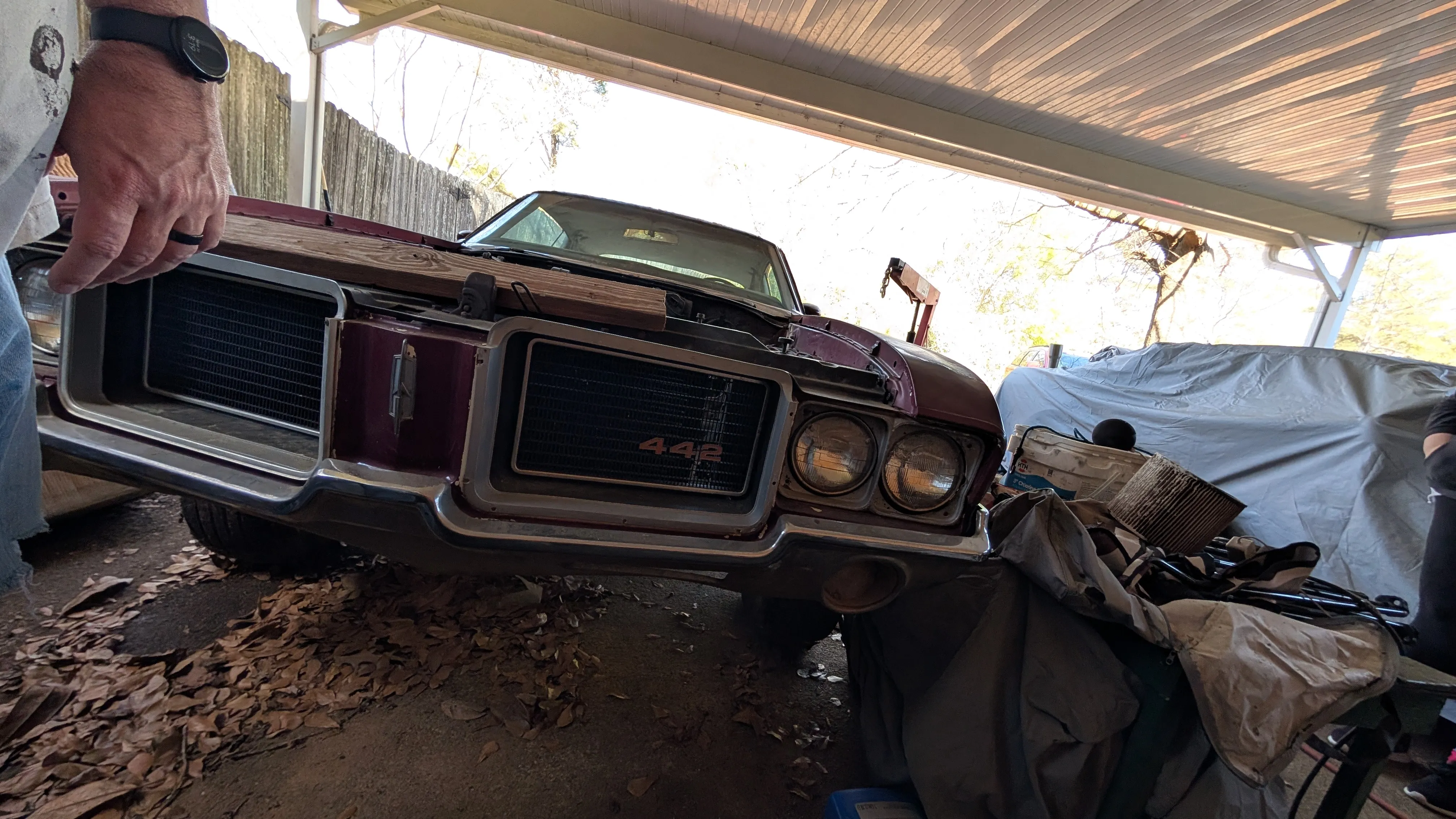 Father-in-law working on a car